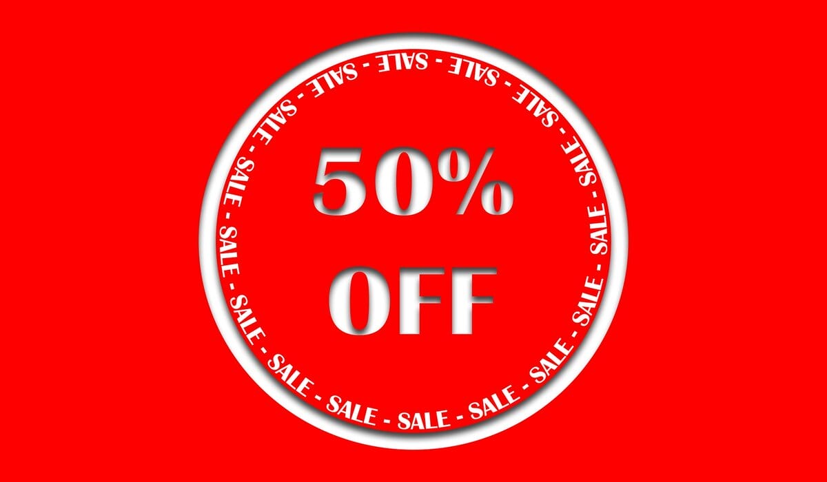White 50% Off Sign On Red Background