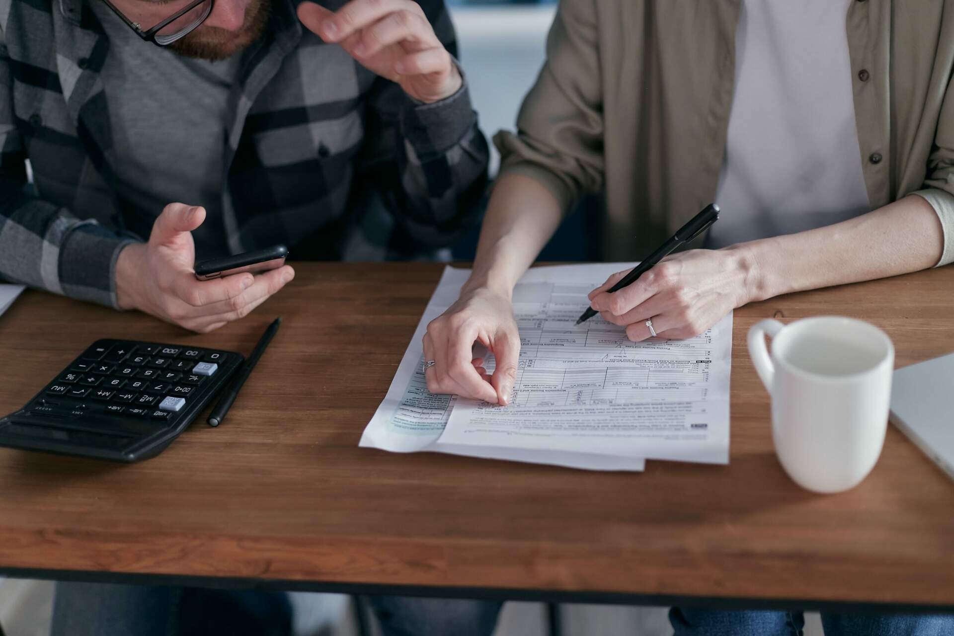 People Checking Finances