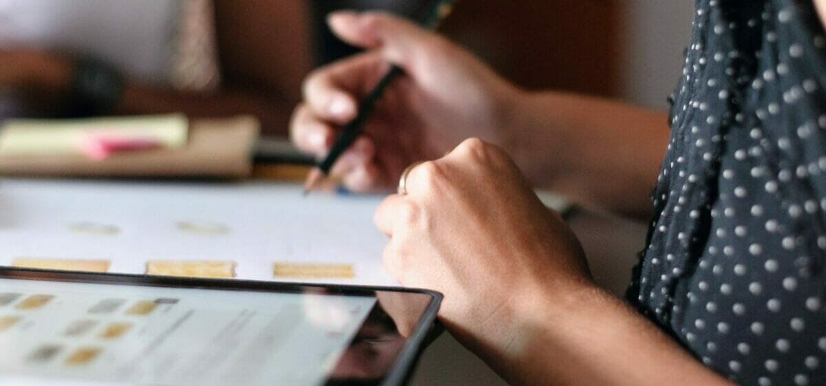 Woman Making Sketch On Paper With Pen